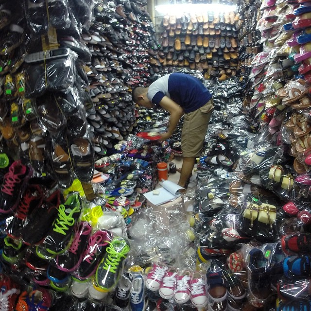 Hundreds and hundreds of #shoes. Vendor in the alleys of Binh Tay Market in Ho Chi Minh City, #Vietnam. #ho #chi #minh #city #saigon #market #business #culture #Travel