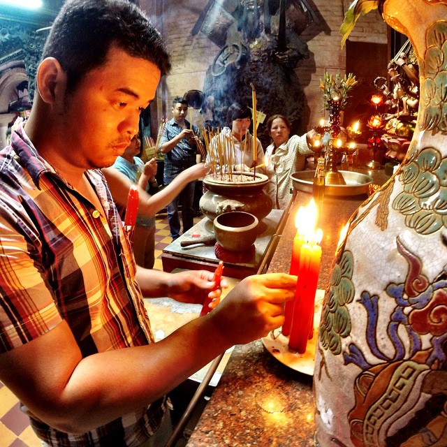 Worshipper at the Jade Emperor Pagoda in Ho Chi Minh City. #religion #pray #worship #Tao #spiritual #ho #chi #minh #city #saigon #Vietnam #Travel