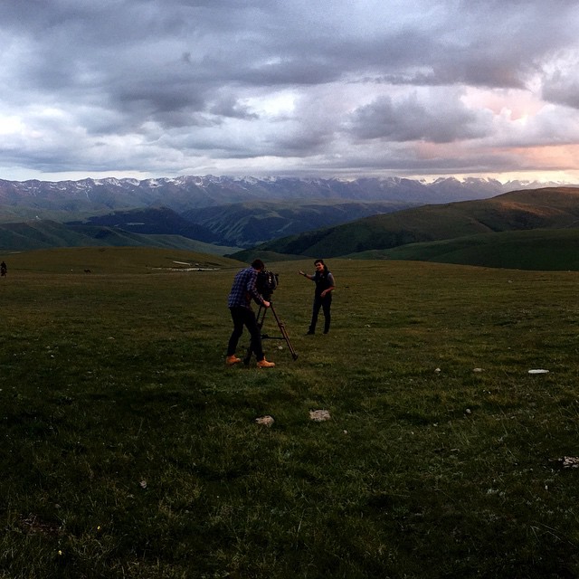 Filming an on-camera element on the Tien Shan Mountains of #Kazakhstan at #sunset. Kyrgyzstan is just over the snow-topped peaks in the distance. #travel #cnn #cnnsilkroad #gothere #nature