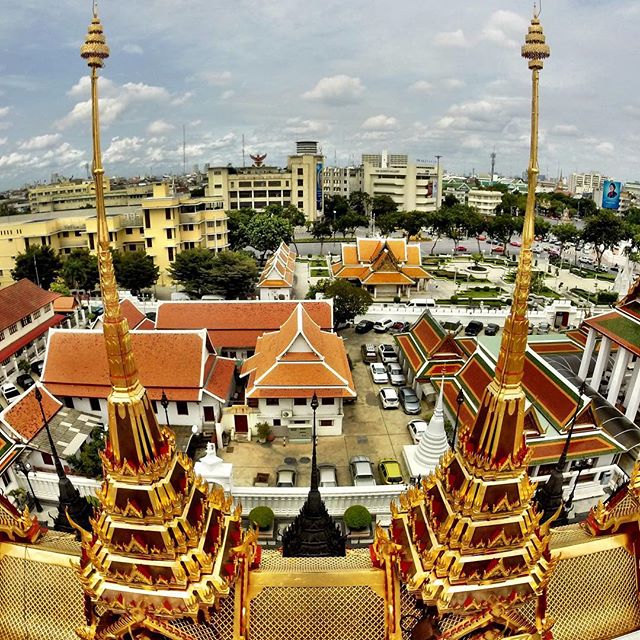 View of Bangkok from the top of Wat Ratchanatdaram, a Buddhist temple in the Banglamphu district. These are just two of the building's 37 spires. #Bangkok #Thailand #travel #buddha #temple