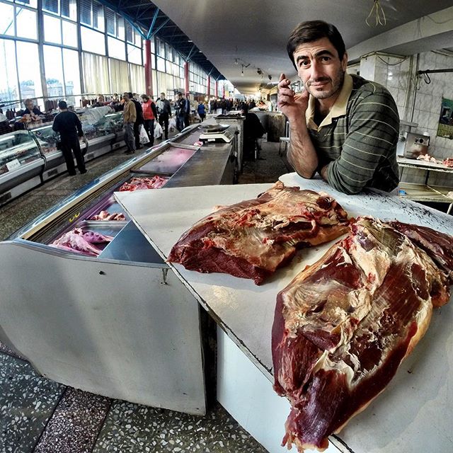 Nothing like a butcher who can cut a piece of fresh meat while smoking a cigarette. #Yerevan #Armenia #cnnsilkroad