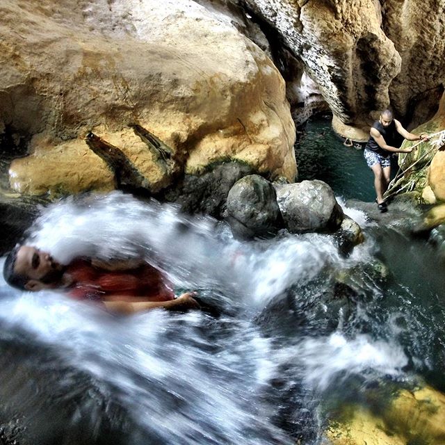 Young Omanis having fun in the waterfall under the cave at Wadi Shab. #wadishab #wadi #Oman #nature #travel
