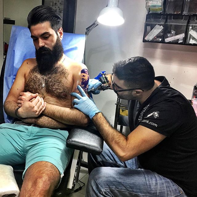 Amman Ink: Jivan Hagopian, a 24-year-old barber from Jordan, getting a tattoo portrait of himself at @huzzink. #amman #jordan #potd #tattoo
