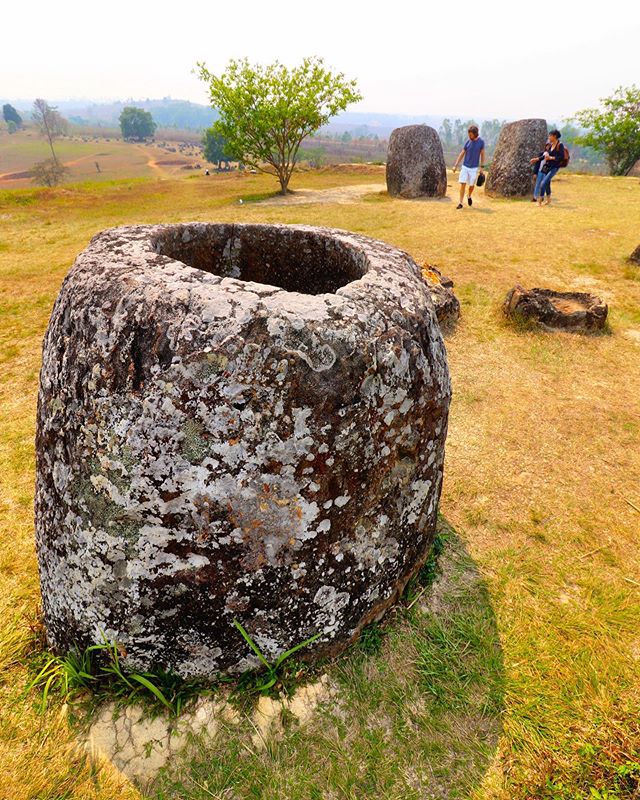Ancient stone jar in central Laos. One of thousands of mysterious relics scattered across the ‘Plain of Jars’ in the Xiang Khouang province. Who built them? When? And why? No one knows.